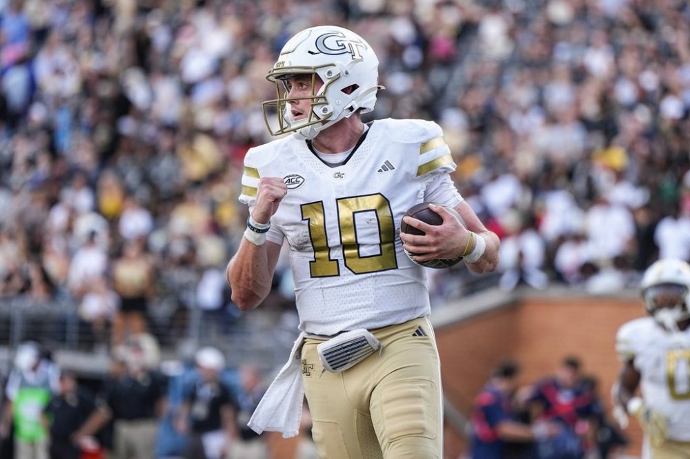 Georgia Tech quarterback Haynes King (10) scores a touchdown during the second half of an NCAA college football game against Wake Forest, Saturday, Sept. 27, 2025, in Winston-Salem, N.C. (AP Photo/Matt Kelley)