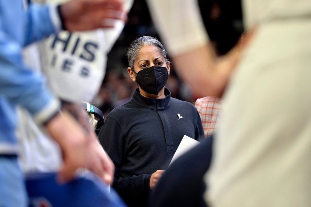 FILE - Memphis Grizzlies assistant coach Sonia Raman stands in a huddle in the first half of an NBA basketball game against the Dallas Mavericks on Jan. 14, 2022, in Memphis, Tenn. (AP Photo/Brandon Dill, File)