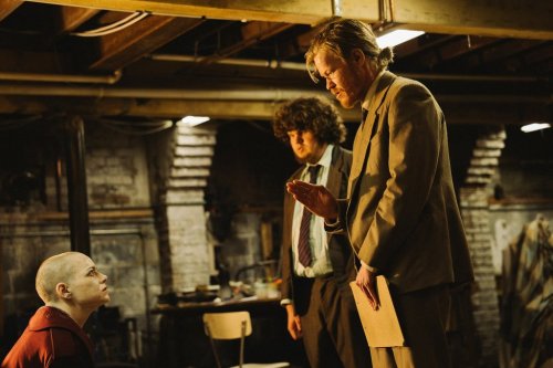 This image released by Focus Features shows Emma Stone, from left, Aidan Delbis, and Jesse Plemons in a scene from 