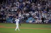 Los Angeles Dodgers' Shohei Ohtani leaves the game during the seventh inning in Game 4 of baseball's World Series against the Toronto Blue Jays, Tuesday, Oct. 28, 2025, in Los Angeles. (AP Photo/David J. Phillip)