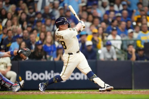 Milwaukee Brewers first baseman Andrew Vaughn (28) hits a solo home run against the Chicago Cubs during the fourth inning of Game 5 of baseball's National League Division Series, Saturday, Oct. 11, 2025, in Milwaukee. (AP Photo/Kayla Wolf)
