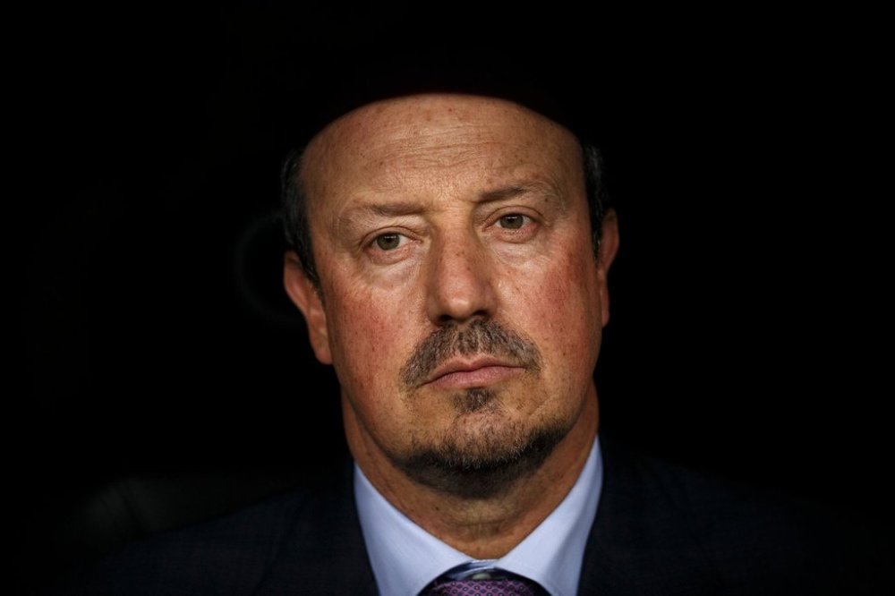 FILE -Real Madrid's head coach Rafa Benitez sits on the bench moments before the Santiago Bernabeu trophy soccer match between Real Madrid and Galatasaray at the Santiago Bernabeu stadium, in Madrid, Aug. 18, 2015. (AP Photo/Daniel Ochoa de Olza, File)
