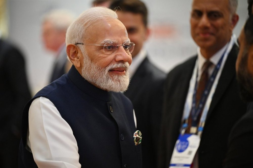 Indian Prime Minister Narendra Modi greets delegates during the India-U. K. CEO Forum at Jio World Convention Centre in Mumbai, India, Thursday, Oct. 9, 2025. (Leon Neal/Pool Photo via AP)