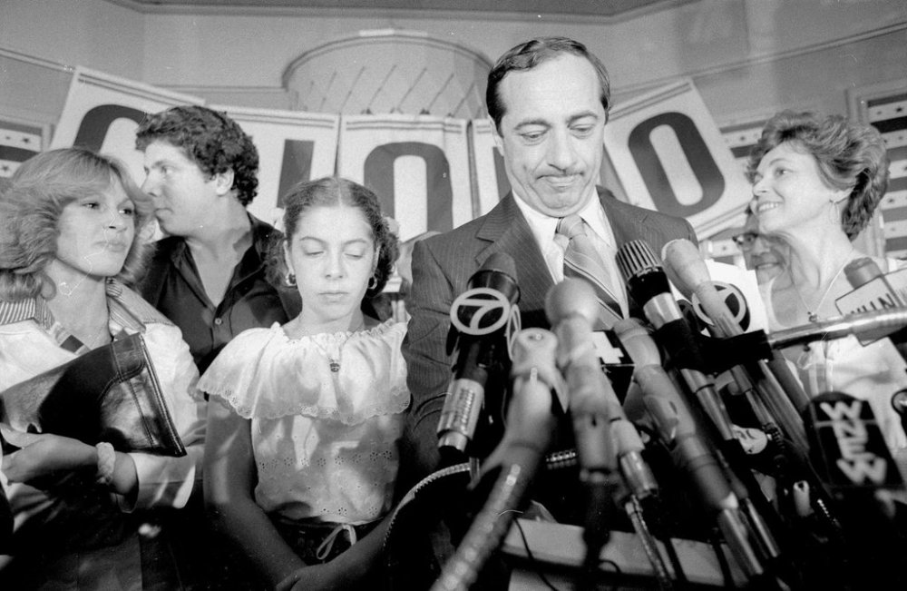 FILE - Joined by his wife, Matilda, right, son Andrew, second from left, and daughter Madeline, third from left, Mario Cuomo faces reporters at his campaign headquarters in New York City, Monday, Sept. 20, 1977, as he concedes that he has lost the Democratic primary runoff for New York City mayor to Ed Koch. (AP Photo, File)