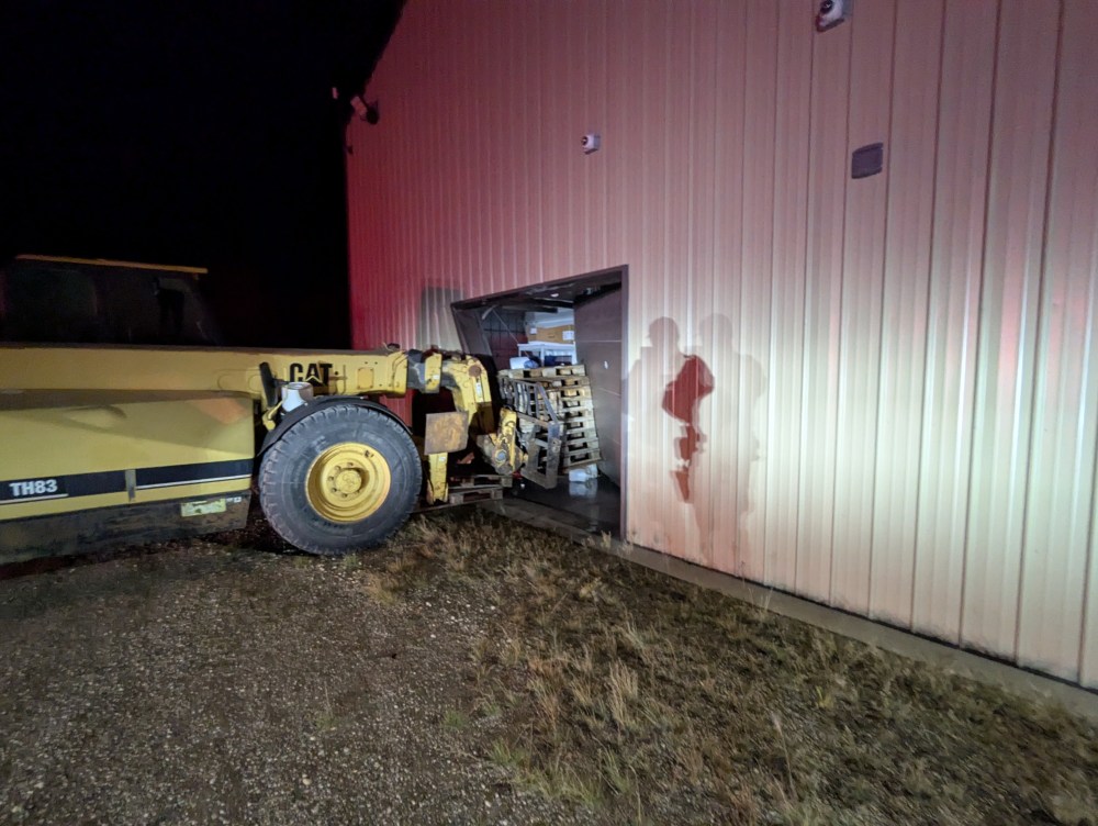 SUPPLIEDRCMP think the person who drove a front-end loader into a business then tried to set it on fire.