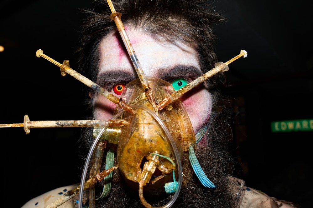 An actor called Patient Negative 1 poses for a portrait at the Erebus Haunted House Thursday, Oct. 2, 2025, in Pontiac, Mich. (AP Photo/Ryan Sun)