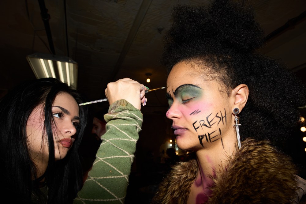 Angie Acosta, of Auburn Hills, left, applies make up on an actor at the Erebus Haunted House Thursday, Oct. 2, 2025, in Pontiac, Mich. (AP Photo/Ryan Sun)