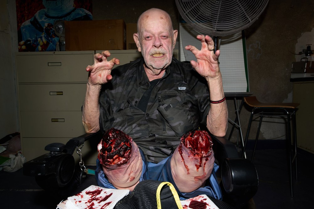 Leonard Noe, who had both legs amputated after an infection, poses for a portrait at the Erebus Haunted House, Oct. 2, 2025, in Pontiac, Mich. (AP Photo/Ryan Sun)