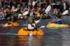 Nina Richards, dressed as Shrek, races in a giant pumpkin during the West Coast Giant Pumpkin Regatta on Sunday, Oct. 19, 2025, in Tualatin, Ore. (AP Photo/Jenny Kane)