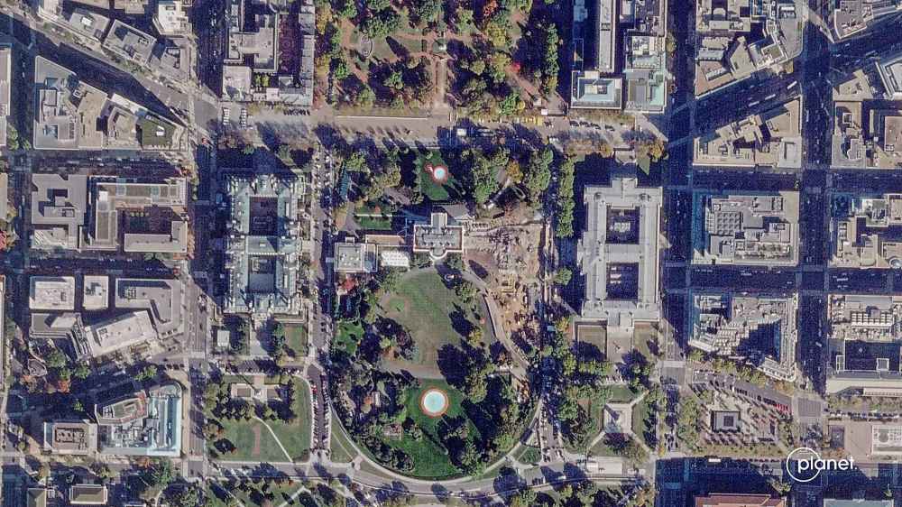 This satellite image from Planet Labs PBC shows demolition of the East Wing of the White House in Washington, Thursday, Oct. 23, 2025. (Planet Labs PBC via AP)