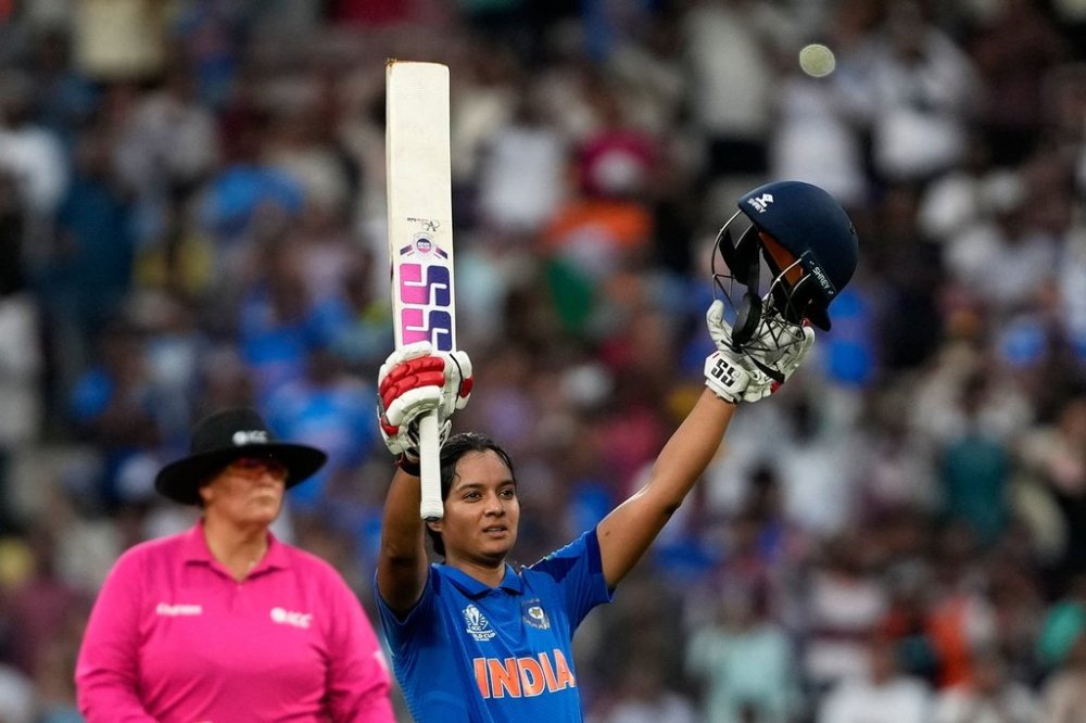 India's Pratika Rawal celebrates her century during the ICC Women's Cricket World Cup cricket match between India and New Zealand at DY Patil Stadium in Navi Mumbai, India, Thursday, Oct. 23, 2025. (AP Photo/Rajanish Kakade)
