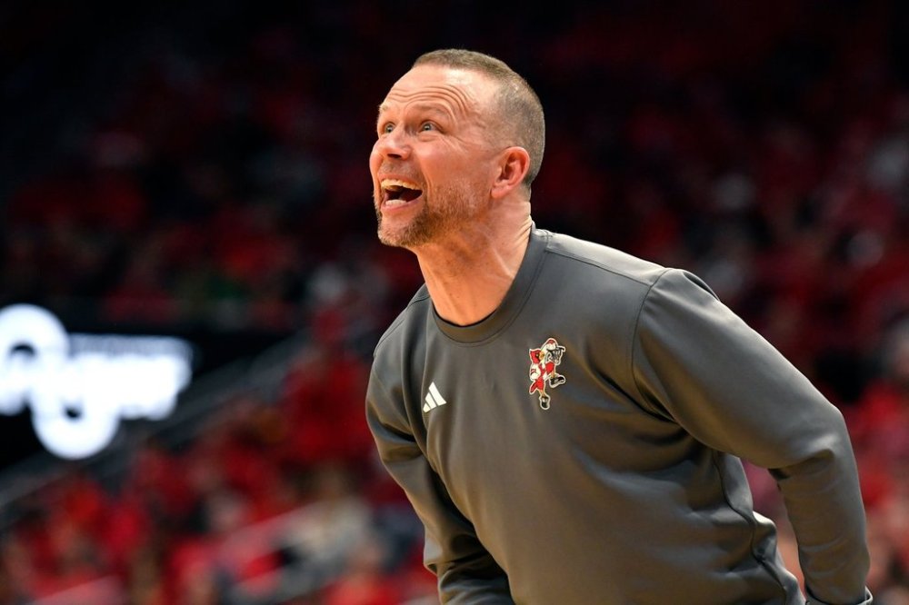 FILE - Louisville head coach Pat Kelsey shouts instructions to his team during the second half of an NCAA college basketball game against Stanford in Louisville, Ky., March 8, 2025. (AP Photo/Timothy D. Easley, File)