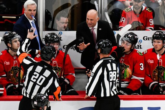 Chicago Blackhawks head coach Jeff Blashill talks with officials during an Oct. 11 game against the Montreal Canadiens. (Matt Marton / The Associated Press files)