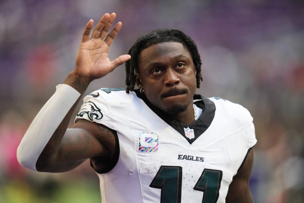 Philadelphia Eagles wide receiver A.J. Brown (11) walks off the field after a win over the Minnesota Vikings in an NFL football game Sunday, Oct. 19, 2025, in Minneapolis. (AP Photo/Abbie Parr)