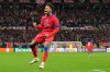 PSG's Desire Doue celebrates after scoring his side's second goal during a Champions League opening phase soccer match between Bayer Leverkusen and Paris Saint-Germain in Leverkusen, Germany, Tuesday, Oct. 21, 2025. (AP Photo/Martin Meissner)