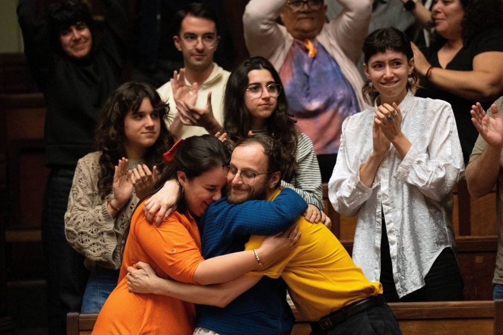 People celebrate after Uruguay's senate passed a law decriminalizing euthanasia, in Montevideo, Uruguay, Wednesday, Oct. 15, 2025. (AP Photo/Matilde Campodonico)