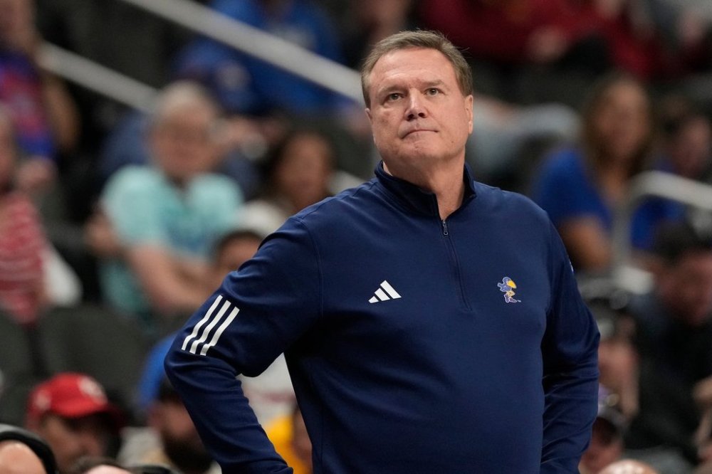 FILE - Kansas head coach Bill Self rects on the sidelines during the second half of an NCAA college basketball game against UCF in the second round of the Big 12 Conference tournament, March 12, 2025, in Kansas City, Mo. (AP Photo/Charlie Riedel, File)