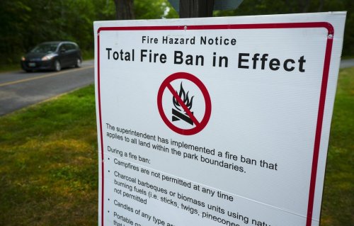 A fire ban sign is displayed at Fitzroy Provincial Park on the Ottawa River, in Fitzroy Harbour, Ont., Tuesday, Aug. 12, 2025. THE CANADIAN PRESS/Sean Kilpatrick