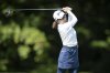 Minami Katsu, of Japan, tees off on the ninth hole during the first round of the Kroger Queen City Championship golf tournament, Thursday, Sept. 11, 2025, at TPC River's Bend in Cincinnati. (AP Photo/Tanner Pearson)