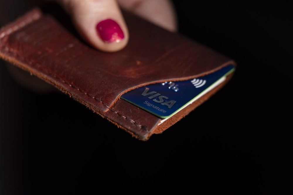 File photo — A Visa card is displayed in a wallet on Wednesday, May 15, 2024, in Portland, Ore. THE CANADIAN PRESS/AP/Jenny Kane