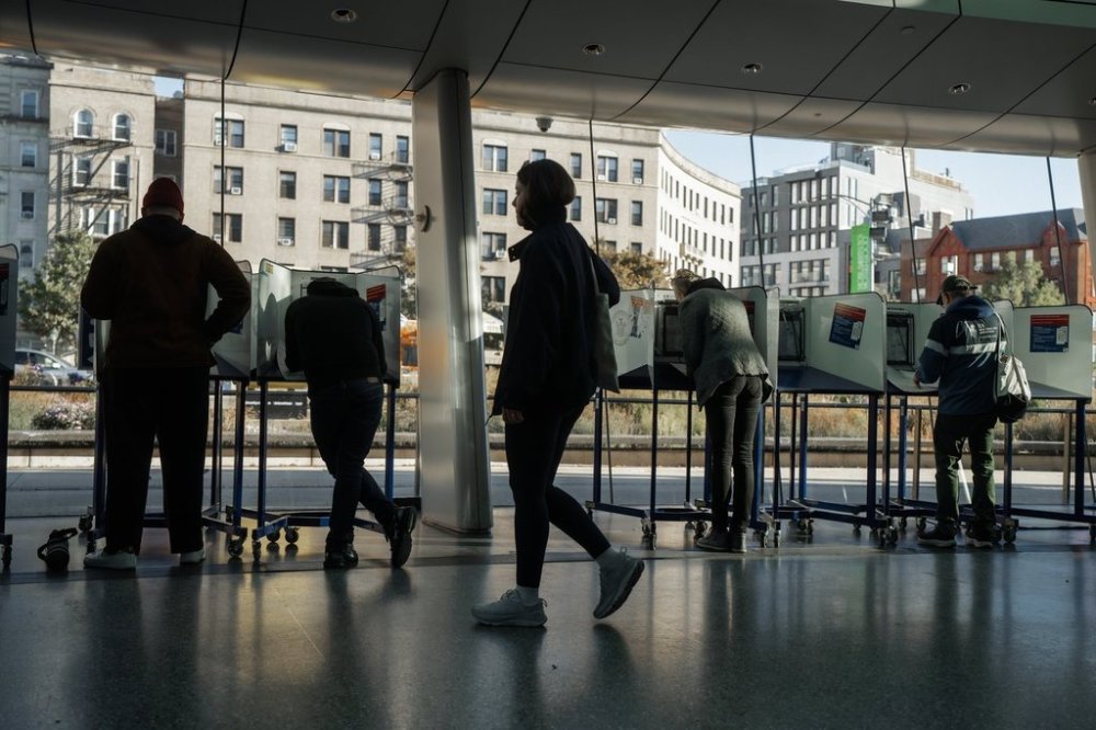 People cast their ballots during early voting on Saturday, Oct. 25, 2025, in New York. (AP Photo/Olga Fedorova)