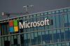 FILE - The logo of Microsoft is seen outside its French headquarters in Issy-les-Moulineaux, outside Paris on May 13, 2024. (AP Photo/Thibault Camus, File)