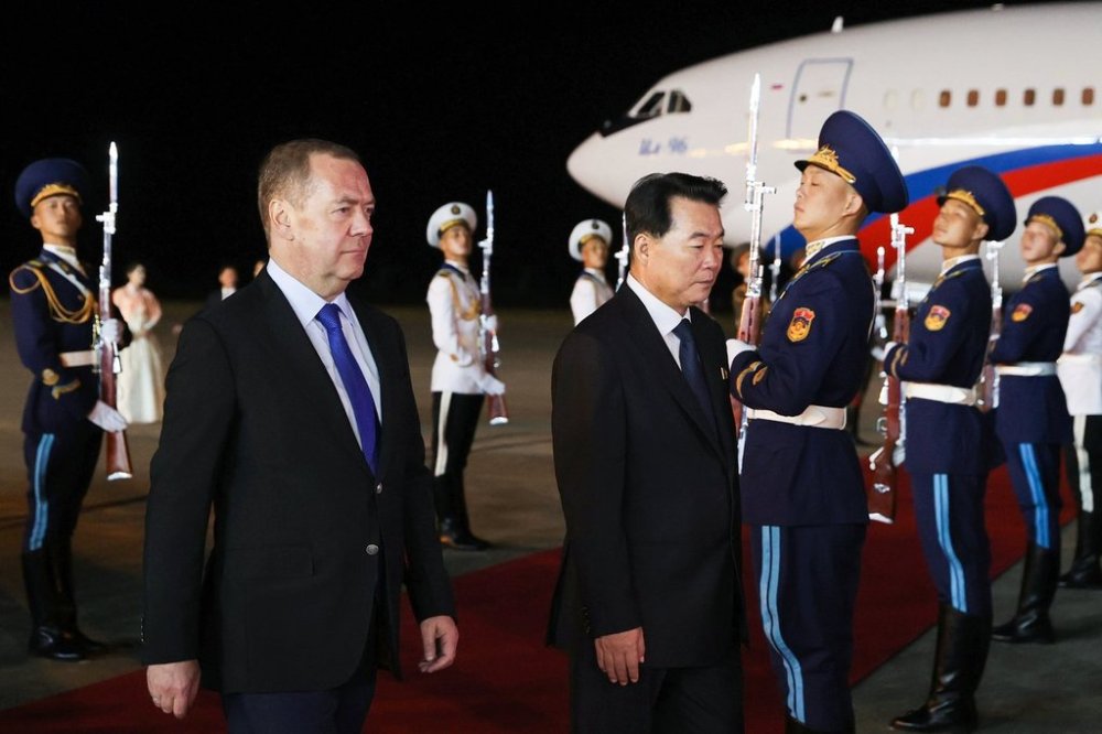 Russian Security Council Deputy Chairman and the head of the United Russia party Dmitry Medvedev, left, is greeted by North Korean Deputy Foreign Minister Im Cheon Il upon his arrival in Pyongyang, North Korea, Wednesday, Oct. 8, 2025, on the occasion of the 80th anniversary of the founding of North Korea's ruling Worker's Party of Korea. (Ekaterina Shtukina, Sputnik, Pool Photo via AP)