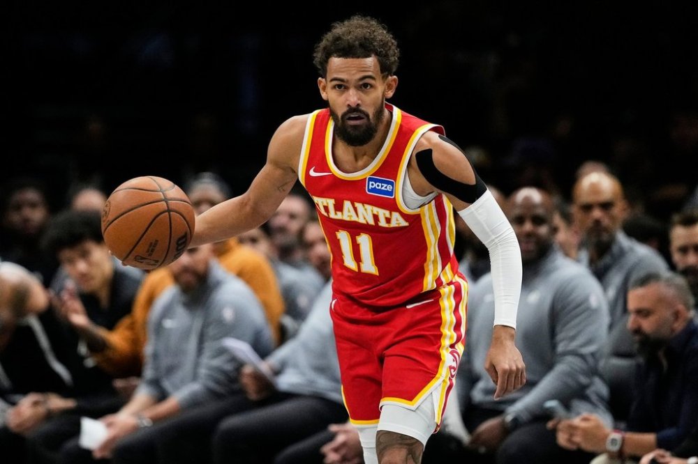 Atlanta Hawks' Trae Young (11) looks to pass during the first half of an NBA basketball game against the Brooklyn Nets Wednesday, Oct. 29, 2025, at Barclays Center in New York. (AP Photo/Frank Franklin II)