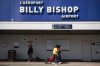 People arrive at Billy Bishop Airport in Toronto on Friday, July 19, 2024. THE CANADIAN PRESS/Christopher Katsarov