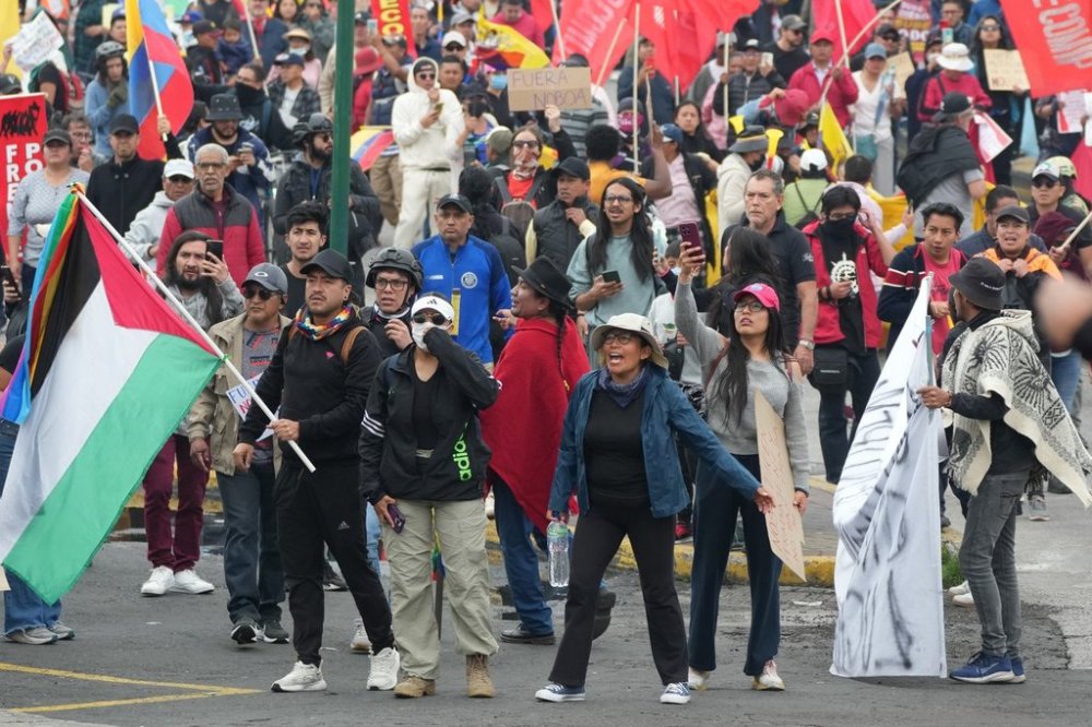 Demonstrators protest President Daniel Noboa's government, in Quito, Ecuador, Sunday, Oct. 12, 2025. (AP Photo/Dolores Ochoa)