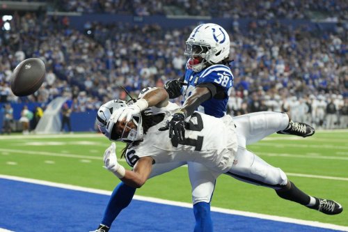 Indianapolis Colts' Chris Lammons (38) breaks up a pass intended for Las Vegas Raiders wide receiver Jakobi Meyers (16) during the second half of an NFL football game, Sunday, Oct. 5, 2025, in Indianapolis. (AP Photo/AJ Mast)
