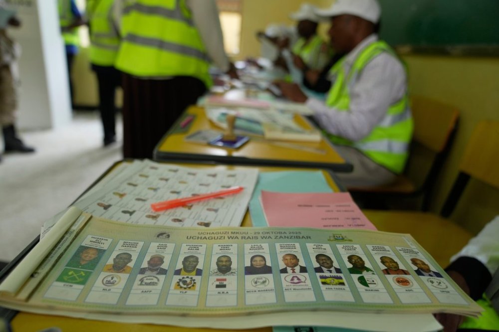 Ballot papers bearing the names of the presidential candidates at Tumekuja Secondary School polling station in Zanzibar, Tanzania, Tuesday, Oct. 28, 2025. (AP Photo/Brian Inganga)