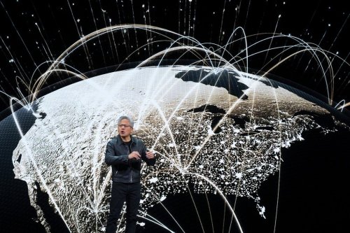 NVIDIA CEO Jensen Huang speaks on how AI infrastructure and AI factories that generate intelligence at scale are powering a new industrial revolution, at Washington Convention Center, Tuesday, Oct. 28, 2025, in Washington. (AP Photo/Manuel Balce Ceneta)