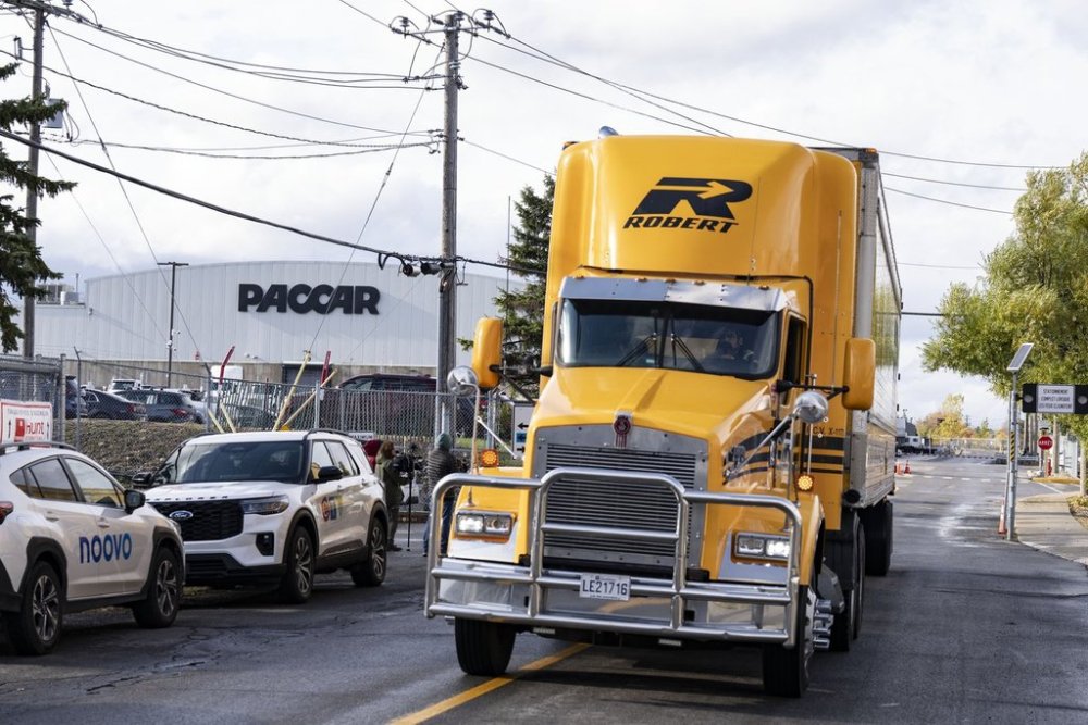 Paccar Inc., a commercial truck manufacturing plant is seen in Sainte-Therese, Quebec on Wednesday, Oct. 22, 2025. The company announced it has laid off 300 workers due to tariffs from the United States. THE CANADIAN PRESS/Christinne Muschi