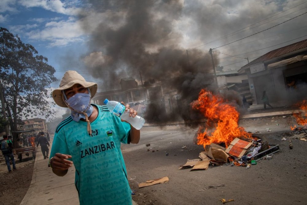 People protest in the streets of Arusha, Tanzania, on election day Wednesday, Oct. 29, 2025. (AP Photo/str)