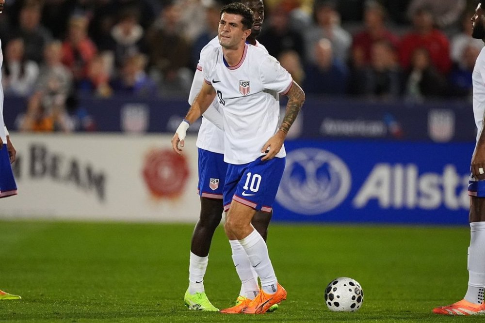 FILE - United States forward Christian Pulisic (10) walks after being injured during the first half of an international friendly soccer match against Australia, Tuesday, Oct. 14, 2025, in Commerce City, Colo. (AP Photo/David Zalubowski, File)