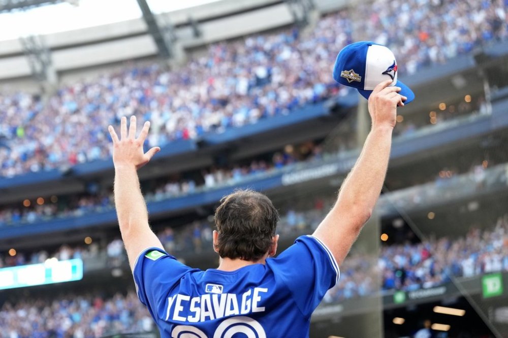 Toronto Blue Jays pitcher Trey Yesavage (39) comes out to a standing ovation as he greets fans after he was pulled from the game during sixth inning MLB American League Division Series baseball action against the New York Yankees, in Toronto, Sunday, Oct. 5, 2025. THE CANADIAN PRESS/Nathan Denette