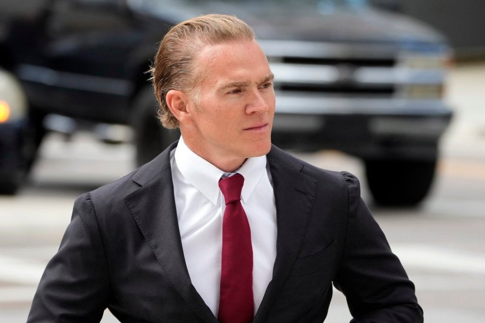 Former Green Beret Jordan Goudreau walks to the United States Courthouse for a bond hearing in Tampa, Fla., Wednesday, Oct. 29, 2025. (AP Photo/Chris O'Meara)