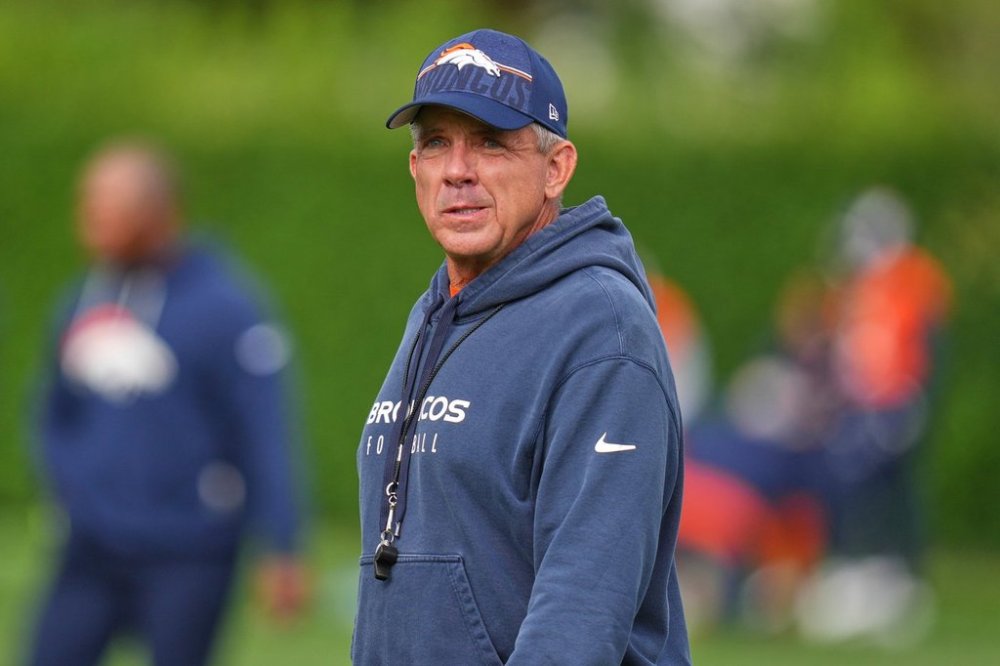 Denver Broncos head coach Sean Payton stands on the sidelines during an NFL training session at Tottenham Hotspur training ground in London, Wednesday, Oct. 8, 2025. (AP Photo/Kirsty Wigglesworth)