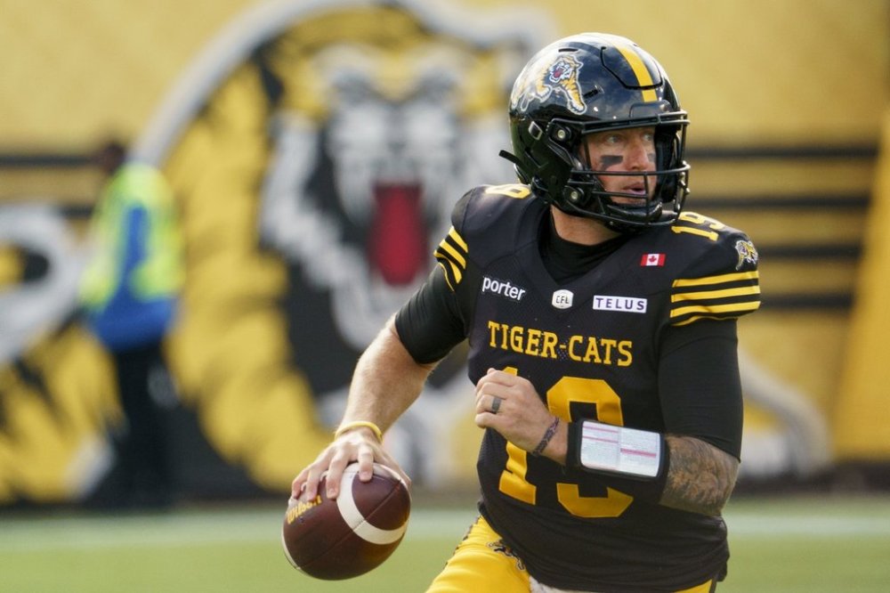 Hamilton Tiger Cats quarterback Bo Levi Mitchell (19) during first half CFL football game action against the Calgary Stampeders in Hamilton, Ont., Saturday, Oct. 11, 2025. THE CANADIAN PRESS/Peter Power