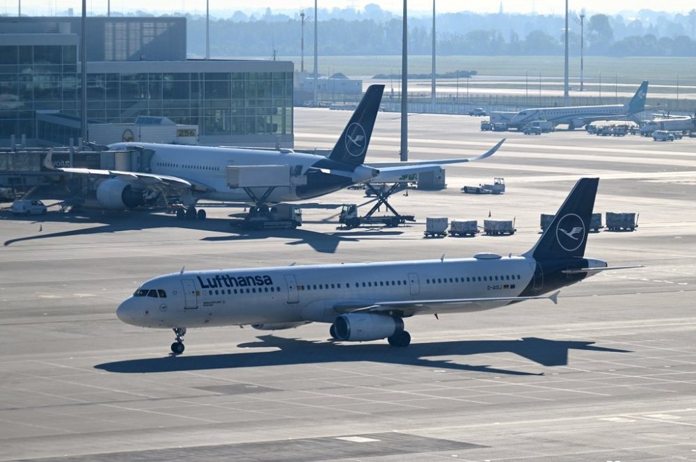 An aircraft taxis at Munich Airport, in Munich, Germany, Friday Oct. 3, 2025. (Felix Hörhager/dpa via AP)