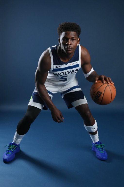 Minnesota Timberwolves guard Anthony Edwards (5) poses for a photo during the NBA basketball team's media day, Monday, Sept. 29, 2025, in Minneapolis. (AP Photo/Abbie Parr)