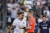 Referee Drew Fischer shows a yellow card to Botafogo's Gregore during the Club World Cup group B soccer match between PSG and Botafogo in Pasadena, Calif., Thursday, June 19, 2025. (AP Photo/Gregory Bull)