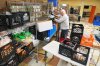Volunteer Bruce Toben packs groceries durning an emergency food distribution at the at The Jewish Federation of Greater Philadelphia's Mitzvah Food Program in Philadelphia, Friday, Nov. 7, 2025. (AP Photo/Matt Rourke)