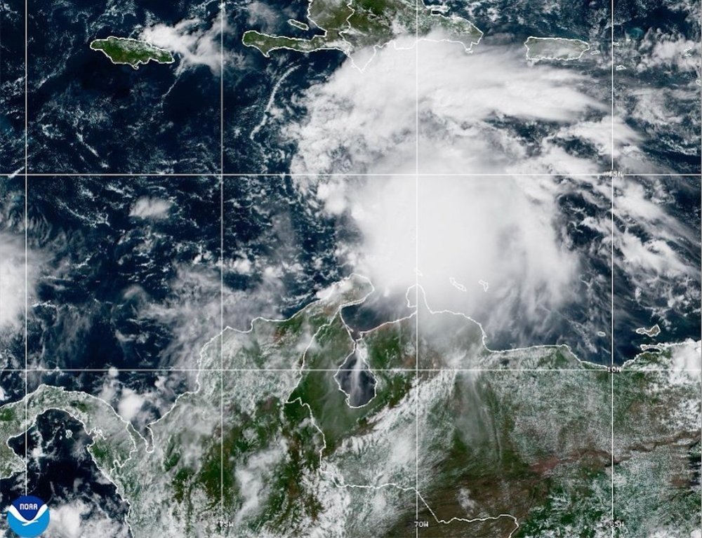 This NOAA satellite image taken at 11:40 a.m. EST on Tuesday, Oct. 21, 2025, shows Tropical Storm Melissa in the Central Caribbean Sea. (NOAA via AP)
