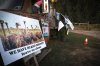 Protest signs are seen on an idle vehicle at the Universal Ostrich Farms in Edgewood, B.C., on Monday, Sept. 22, 2025. THE CANADIAN PRESS/Aaron Hemens