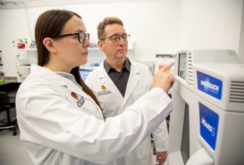 Researcher co-principal investigator Dr. Michael Wieser, PhD, physics professor in the Faculty of Science, right, and Dr. Kerri A. Miller are seen in this handout photo, in Calgary, on Wednesday, Oct. 8, 2025. The researchers are looking for toenail clippings to assist with a research study relating to lung cancer and radon levels. THE CANADIAN PRESS/Handout - Colleen De Neve for University of Calgary UToday (Mandatory Credit)