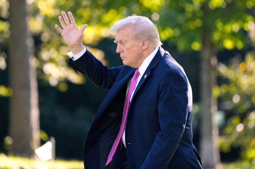 President Donald Trump waves as he walks to depart on Marine One from the South Lawn of the White House on Friday, Oct. 17, 2025, in Washington. (AP Photo/Alex Brandon)