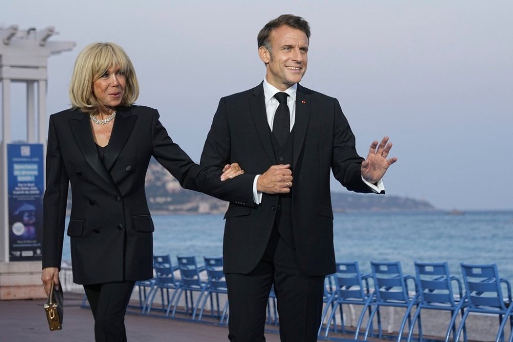 FILE - French President Emmanuel Macron and his wife Brigitte Macron pose before a dinner ahead of the UN Ocean Conference Sunday, June 8, 2025 in Nice, French Riviera. (AP Photo/Laurent Cipriani, file)
