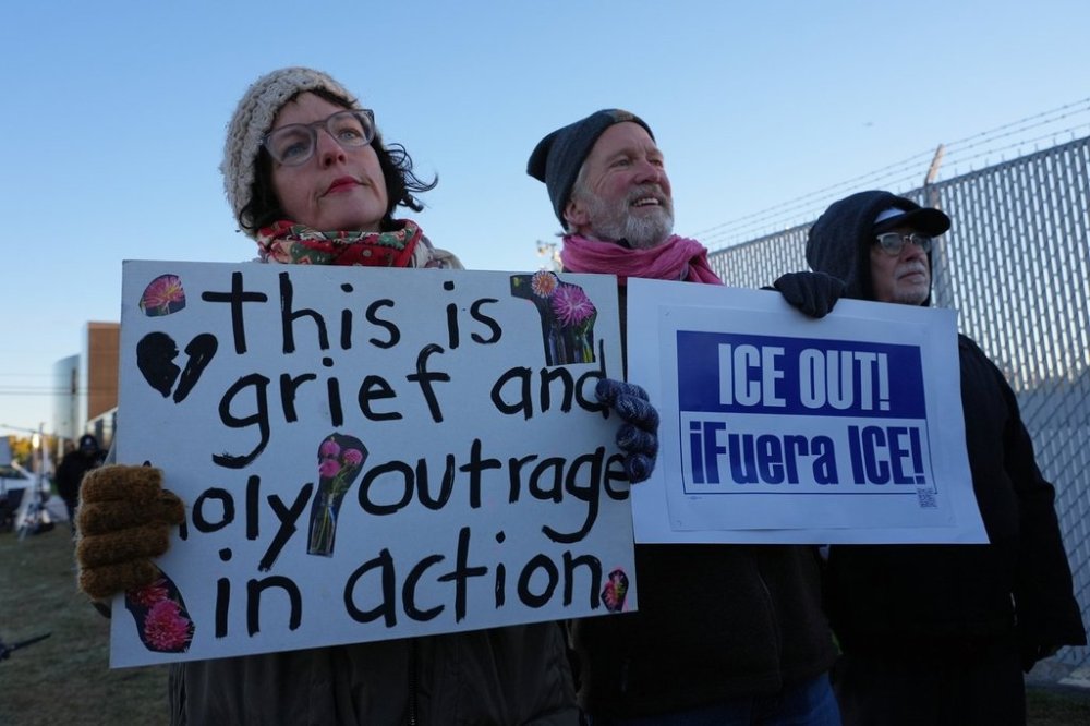 Protesters gather outside an ICE processing facility in Broadview, Ill., a suburb of Chicago, Friday, Oct. 24, 2025. (AP Photo/Nam Y. Huh)